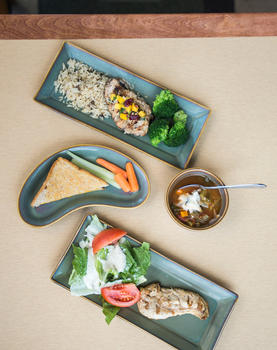 Image of three plates with food on them from Mason dining.